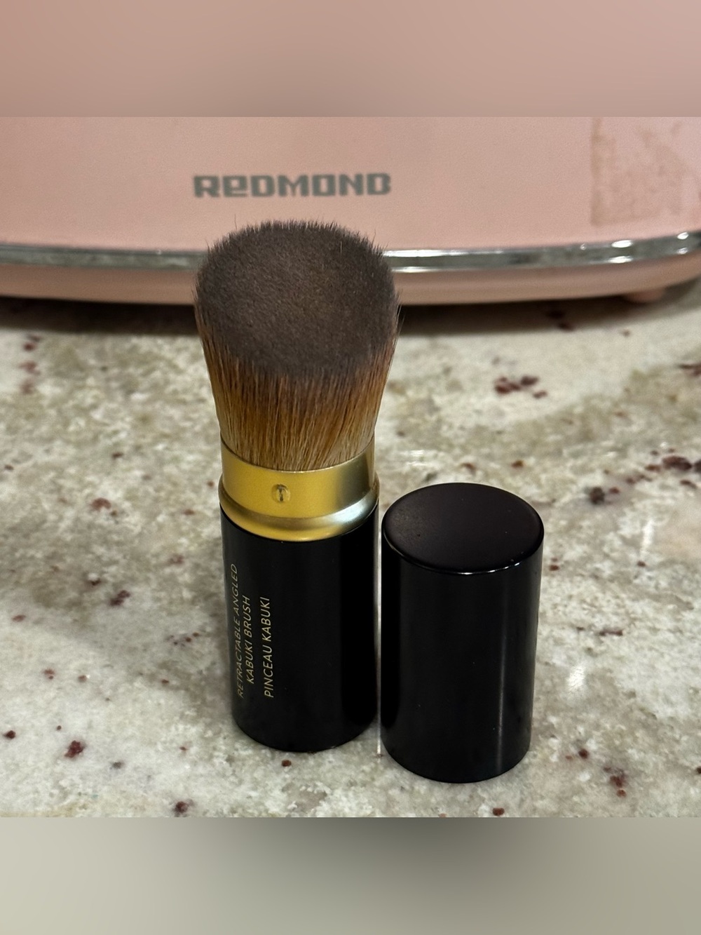 Laura Geller Black and Gold Retractable Kabuki Brush